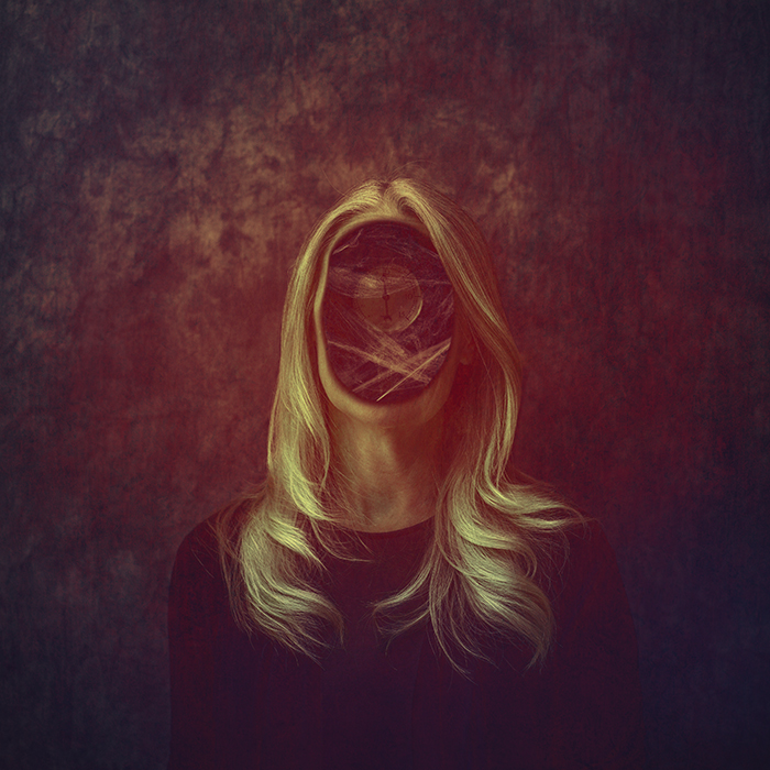 Woman with no face, cobwebs and a gauge in her head. Visual Art Photography. Dark Art Photography. Fine Art Photography.